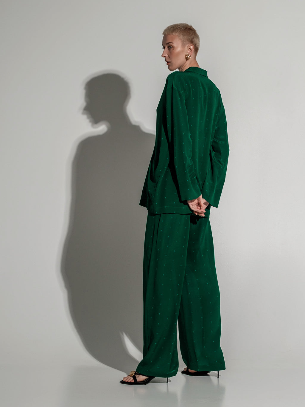 Green feather silk trousers