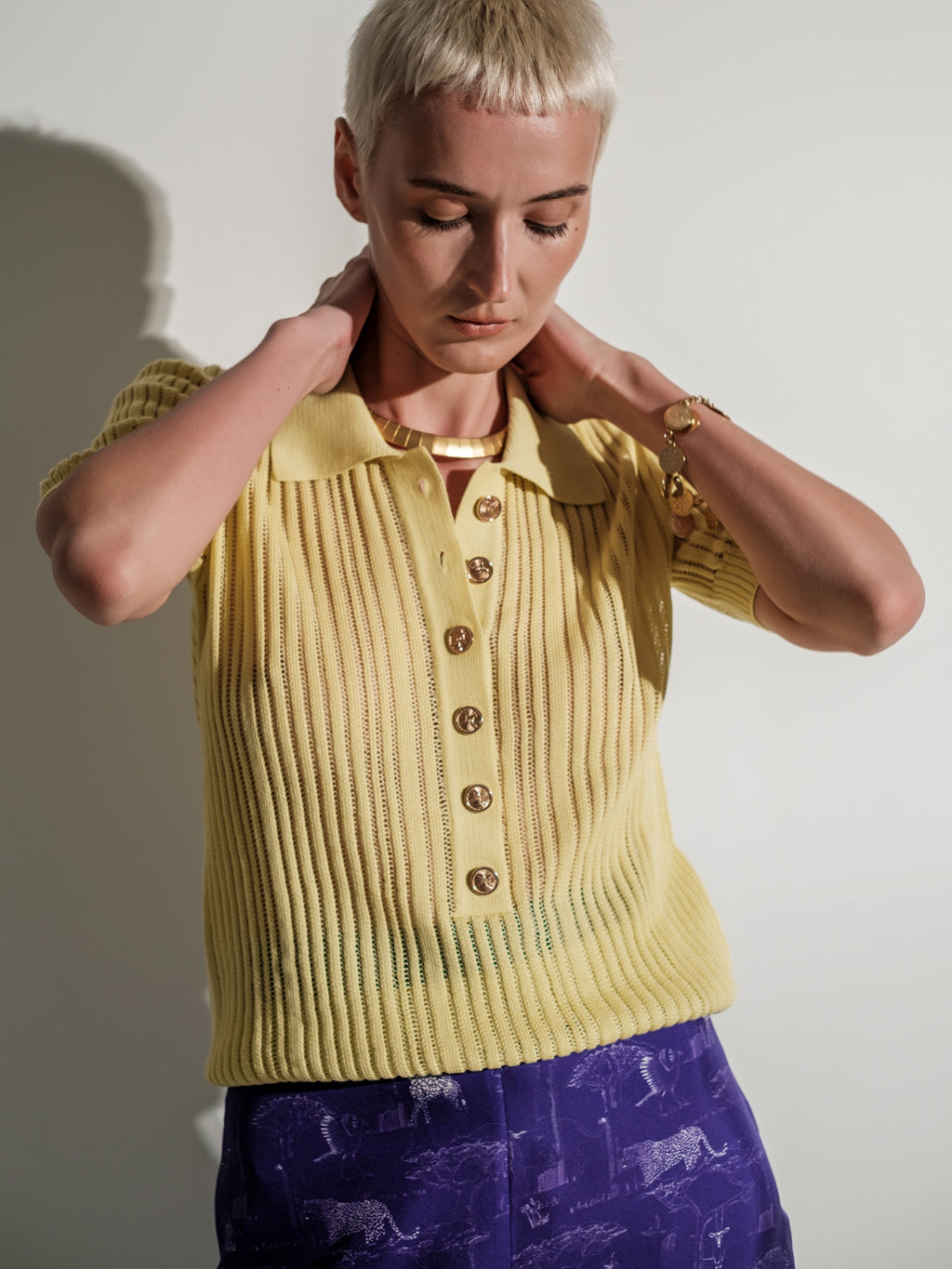 Ribbed knit short-sleeve yellow polo top