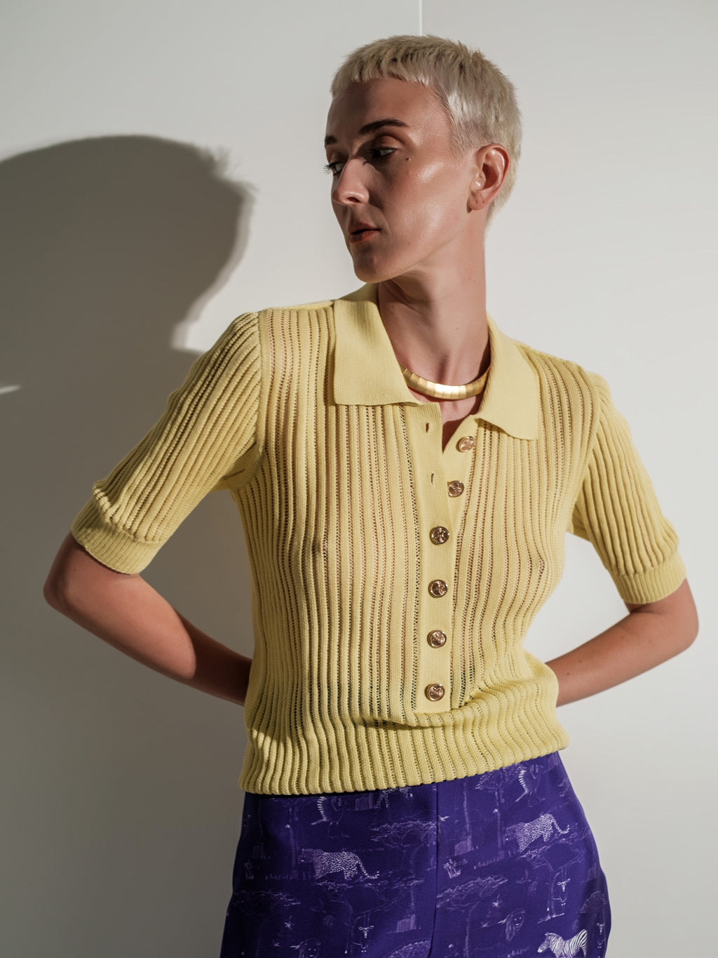 Ribbed knit short-sleeve yellow polo top